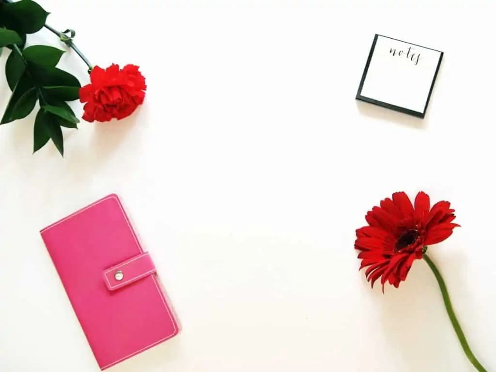 Example gift ideas for mom.  Flowers, wallet or notebook.