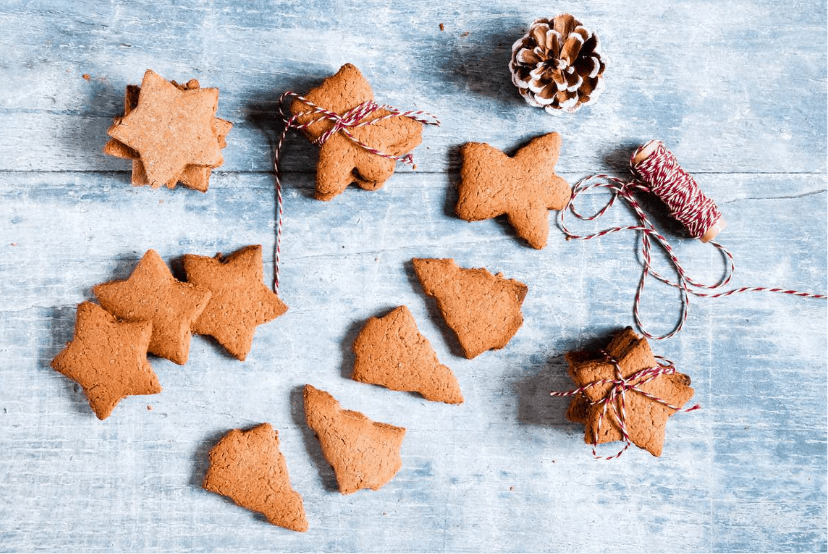 Gingerbread cookies in star and tree shape.