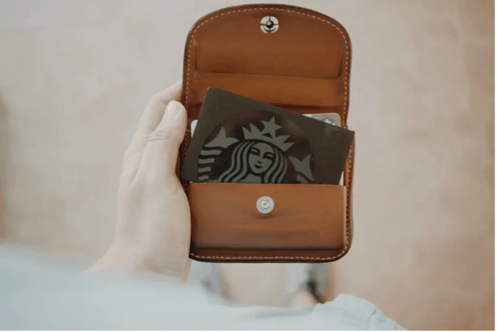 Wallet with a Starbucks gift card in it.