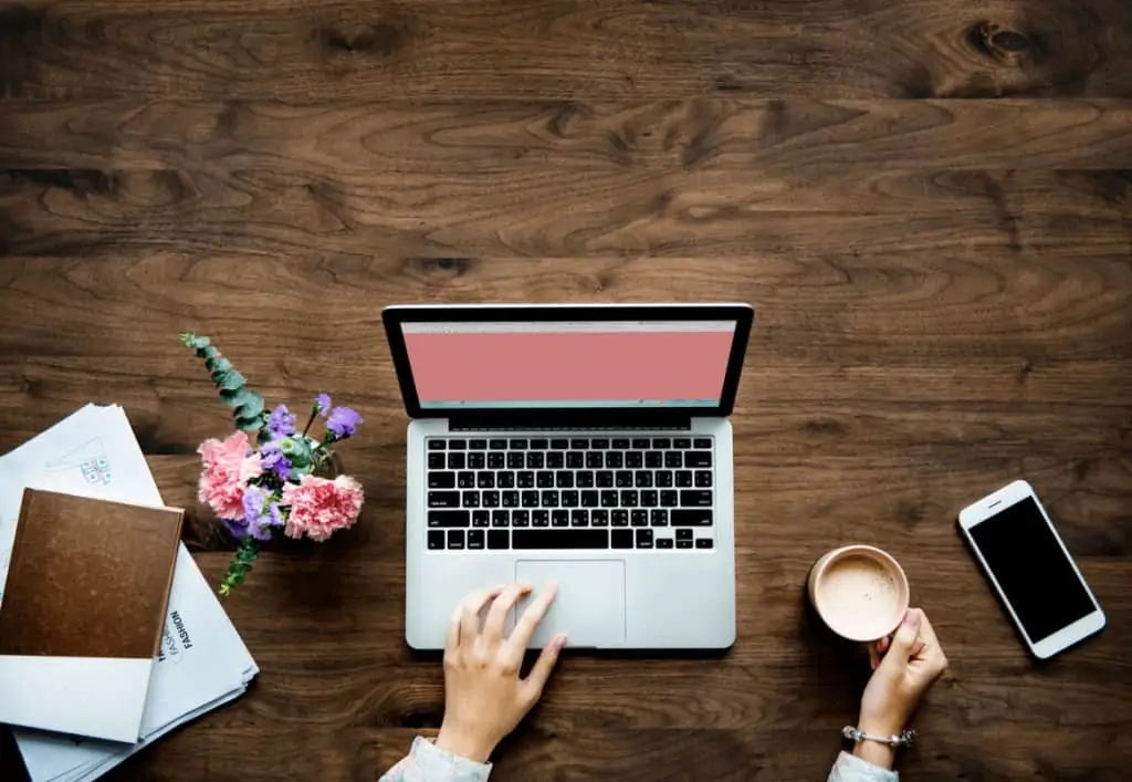 A woman working on her laptop from home