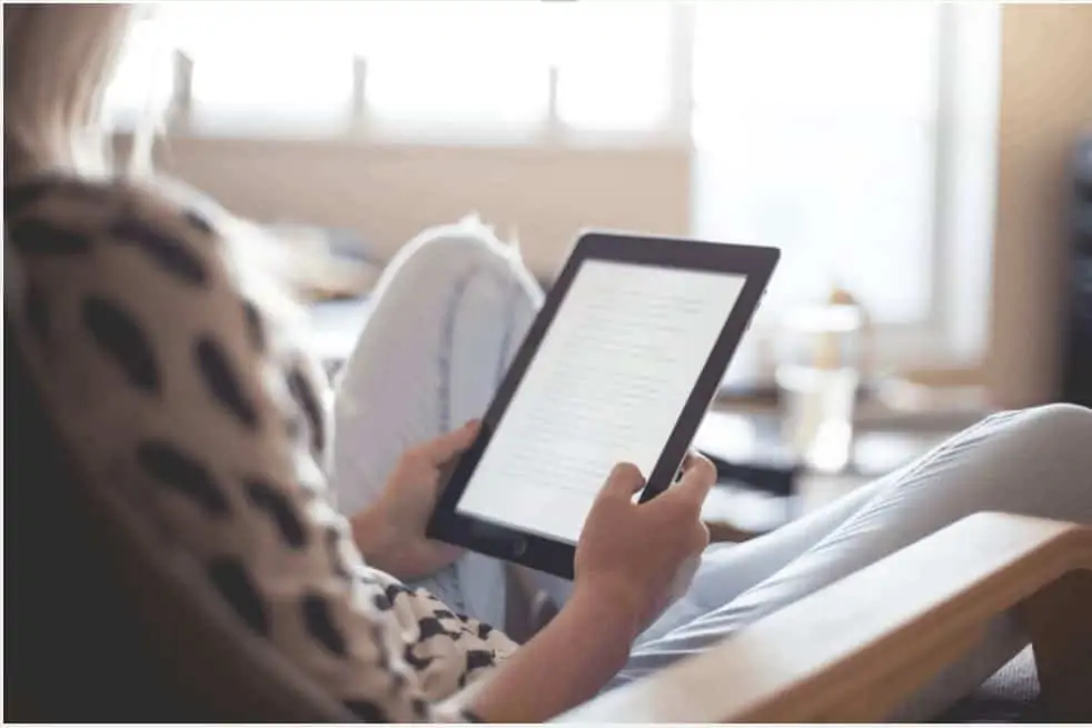 woman on a tablet working as a proofreader 