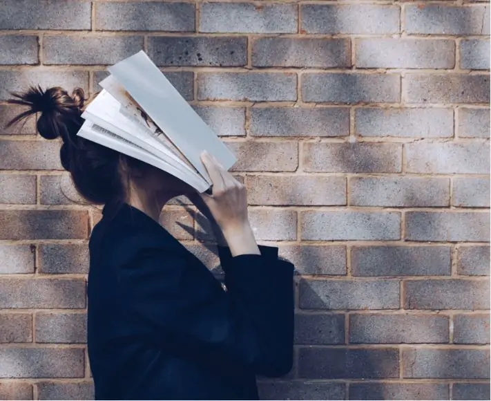 A woman stressing out while tracking her debt