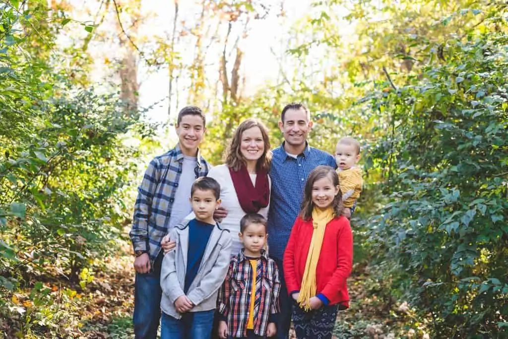 A family of seven posing for a family photo