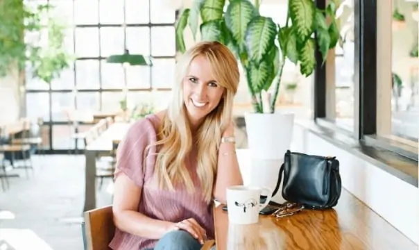 woman at a desk working on being a life coach