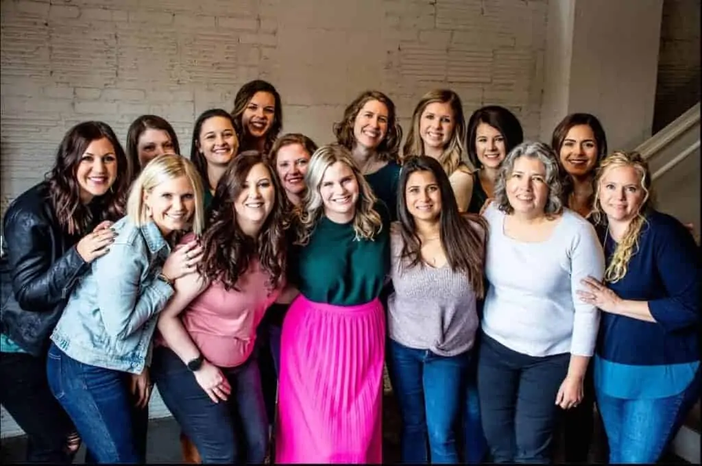 A group of women colleagues posing for a photo 