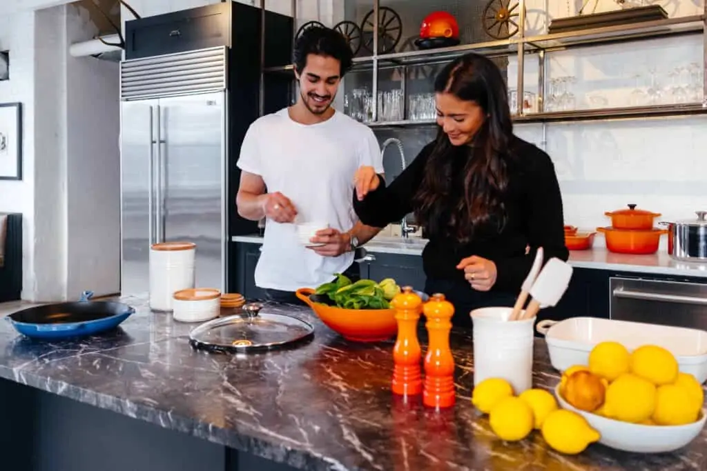 couple making dinner at home