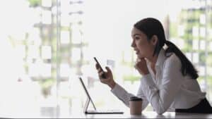 A woman looking at a computer