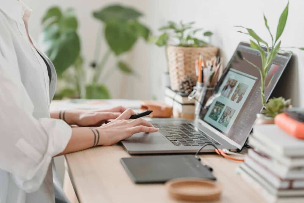 A woman working on a laptop